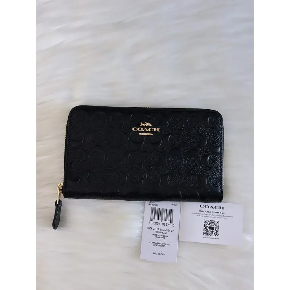 Coach Black Embossed Signature Leather Zip Wallet with Gold Hardware